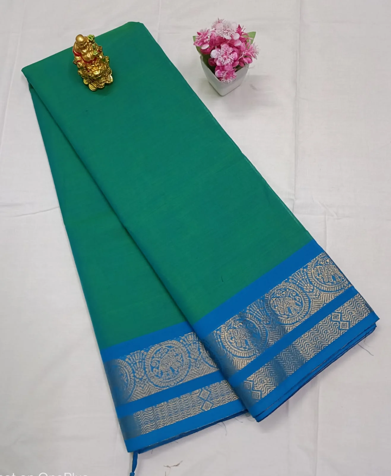 Peacock Green Kanchi Cotton Zari Border Saree